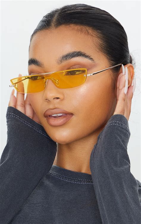 yellow lensed glasses.